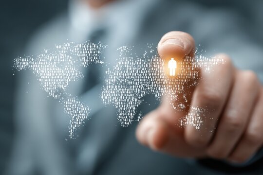 Hand touching world map created from people icons, highlighting connectivity, global reach, and human connection in a digital landscape