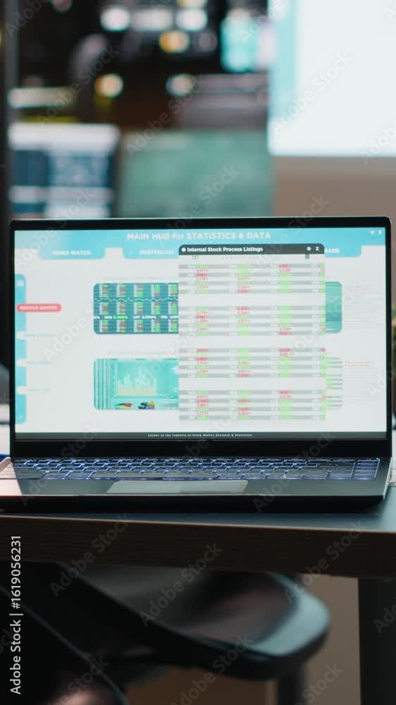Poster vertical video laptop displaying digital data in a clean modern workspace in the evening, projection