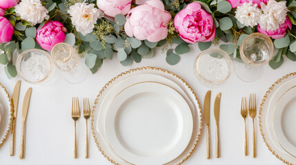 Elegant spring garden party table with pink peony floral arrangement