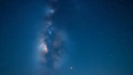 At night, the stars shine in the clear, cloudless sky.