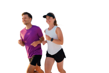 Couples jogging together in vibrant beachwear along a coastal path