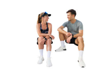 Fitness friends enjoying post-workout conversation and smiles