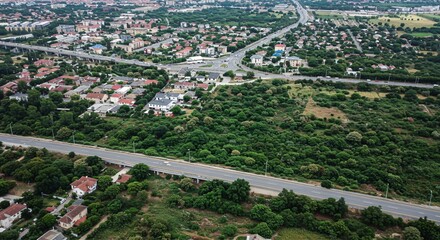 an aerial view of a city with lots of trees