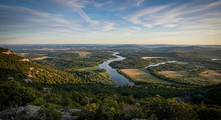 a river running through a lush green valley