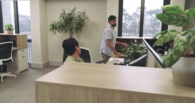 Entering office, Asian man rummaging bag for laptop, lifting bicycle and pushing past coworker