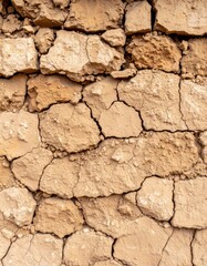 Neutral Beige Stone Wall Texture With Cracks and Natural Weathered Surface Background