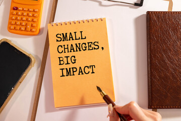 Notepad and the inscription Small changes, big impact