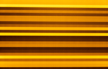Obraz premium abstract background of blurred multicolored stripes in yellow green.