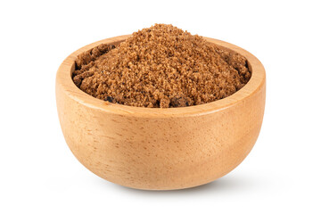 Brown unrefined sugar cane in wooden bowl isolated on white background.