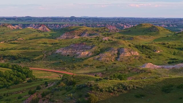 Scenic vibrant view of Roosevelt National Park colorful Canyons under sunset sun