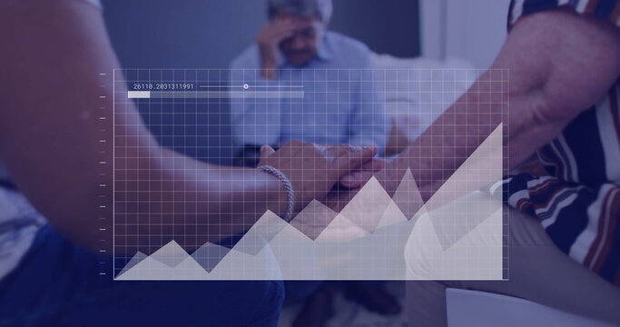 Holding hands three senior adults sharing bond in meeting room with line graph overlay