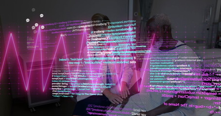 Analyzing couple reviewing tablet in living room, with multicolored code and neon waveform