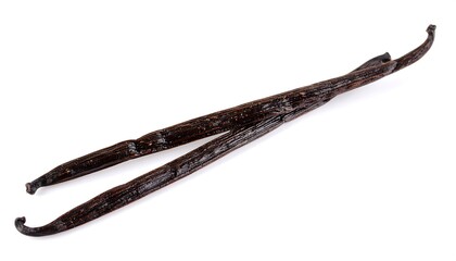 Two dark brown vanilla beans on white background (1)