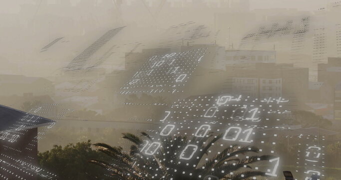 Binary code matrix floating in smoggy cityscape over modern buildings, with palm tree foreground