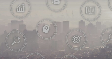 Overlaying icons including magnifying glass and graduation cap over hazy city skyline