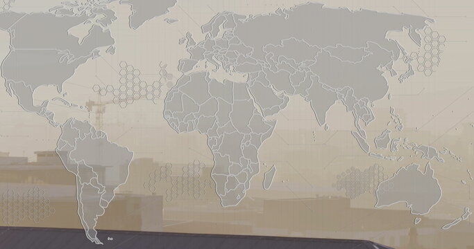 Showing stylized world map overlay spanning city skyline with hexagonal grid, crane, flat rooftops