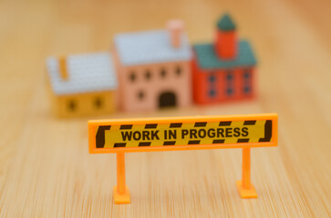 Property Under Maintenance – Foreground Signboard Depicting Active Repairs and Upkeep
