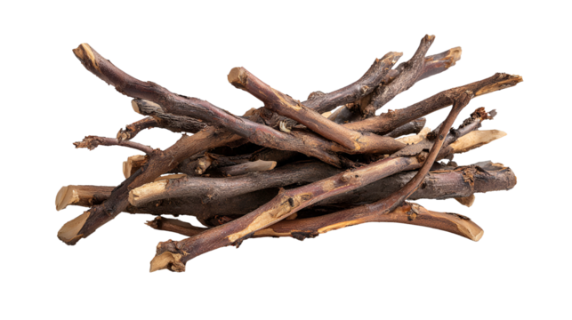 Small brown twigs pile isolated black background