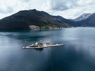 Aerial view of Saint George Island near Perast in the Bay of Kotor, Montenegro, surrounded by calm...