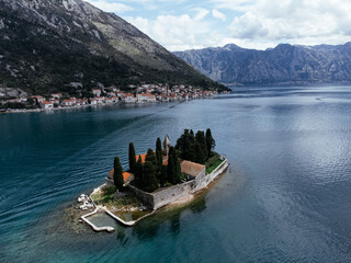 Aerial view of Saint George Island near Perast in the Bay of Kotor, Montenegro, surrounded by calm...