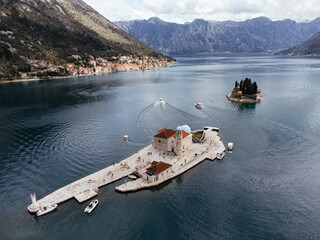 Aerial view of Saint George Island near Perast in the Bay of Kotor, Montenegro, surrounded by calm...
