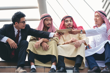 Multicutural Group of people diversity men talking look at digital tablet smile face. Empowering...