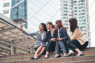 Businesswomen Partner use digital tablet online meeting team Partnership businesswoman talking...