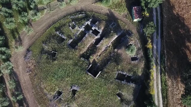 Aerial Drone Ascending over Poggio Civitate Etruscan Ruins in Murlo, Tuscany.