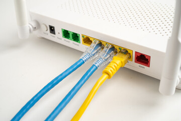 Ethernet cable with wireless router connect to internet service provider internet network.