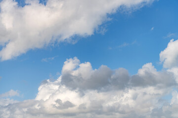 Cloudscape sky background. Cloud in the sky. Background with cloud. Gloomy sky with overcast clouds. Skyscape and cloudscape. Radiant sky with clouds. Cloudy skyscape background