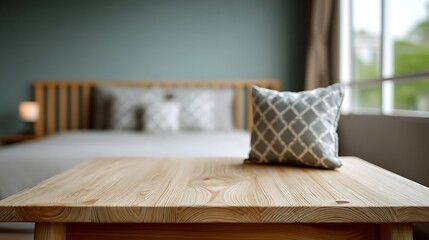 Cozy bedroom with a wooden table and decorative pillow