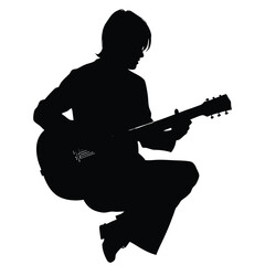 Silhouette of a person playing an acoustic guitar musician