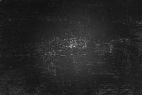 Blank front Real black chalkboard background texture in college concept for back to school kid wallpaper for create white chalk text draw graphic. Empty old back wall education blackboard.