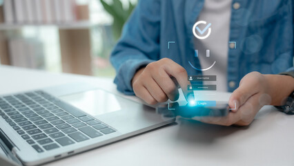 User logging in with face recognition and secure password on smartphone, representing digital...