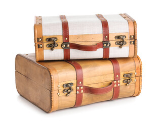 Retro wooden suitcases isolated on white background