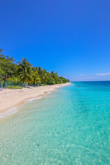 White Sandy Beach With Emerald Green Waters At Semporna Coastal