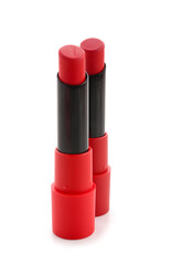 Beautiful red lipsticks on white background