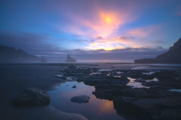 Sunset Over Starfish Rock Beach On South Island New Zealand