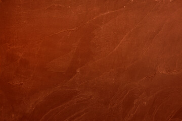 Texture of granite wall painted with brown paint.