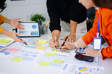 Business team collaboration discussing working analyzing with financial data and marketing growth...