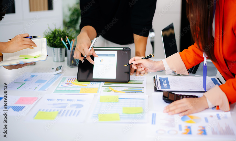 Poster business documents on office table with smart phone and calculator digital tablet and graph business