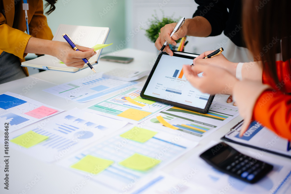 Poster business documents on office table with smart phone and calculator digital tablet and graph business