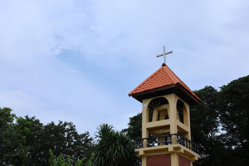 Christian cross installed on the roof, background as a clear day