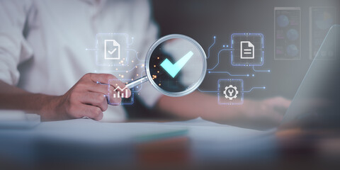Accountant showing office document auditing concept ,plan review process and assess correctness ,Management of important document storage of organization ,document system ,accountant Audit documents