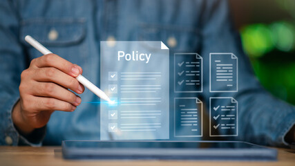 Businessman checking steps through a virtual online document with a list of checkboxes Concepts of practices and policies, company articles of association Terms and Conditions ,quality inspection