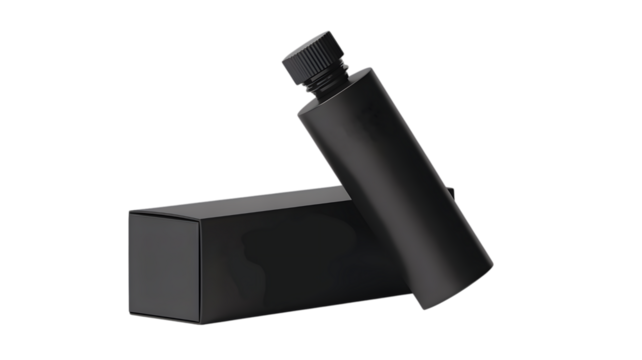 Black cosmetic bottle with cap and box on white background

