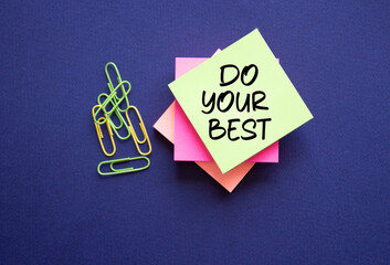 Do your Best symbol. Sticky Notes with words Do your Best. Beautiful deep blue background. Business...
