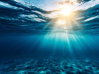 Underwater Sunlight Filtering Through Blue Ocean Water Creating Tranquil Scene