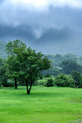 Monsoon landscape near Pune India. Monsoon is the annual rainy season in India from June to...