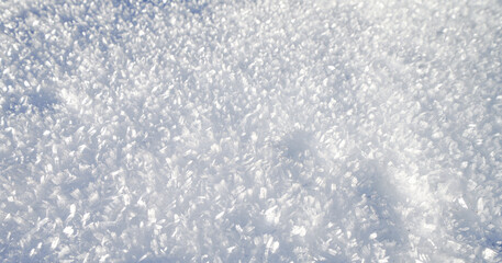 Close-up of snow. Snow-white background.
